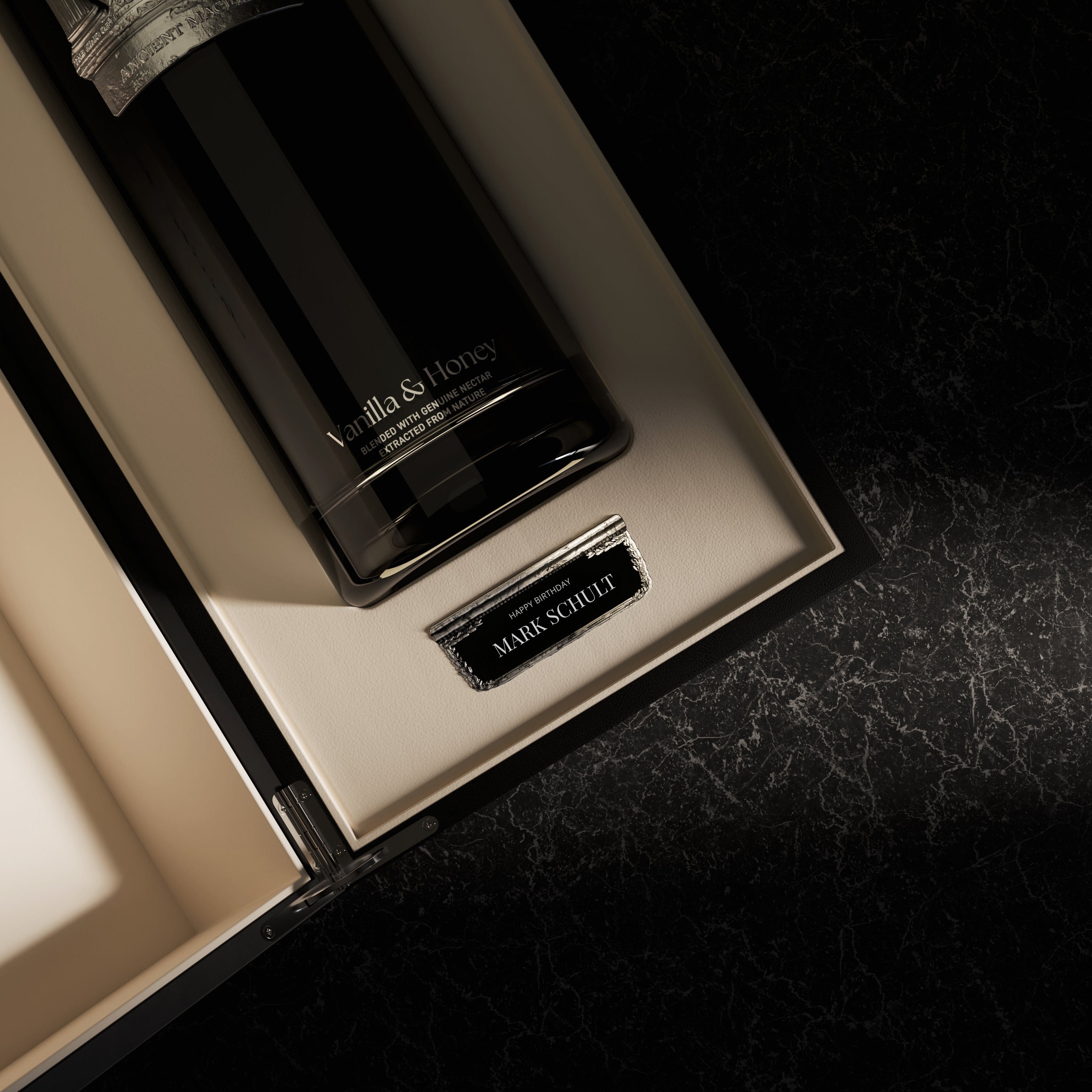 Personalized Maison Dieux Père vodka macérat bottle with custom metal label in its gift box.